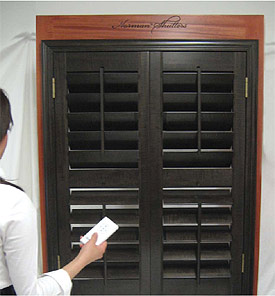 Motorized wood shutters